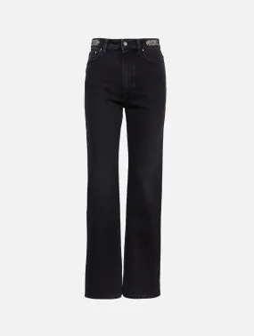 High-rise waist jeans with detailed embellishments.